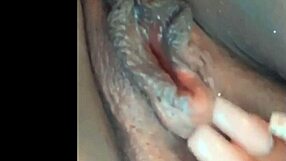 She feels so horny rubbing her pussy while thinking of that big cock.