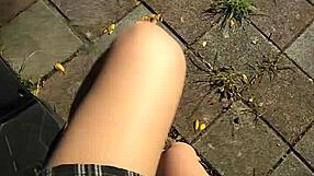 Shemale ting xuan pees outdoors and removes underwear for masturbation in the park