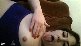 Sexy innocent brunette masturbates by fingering herself in someone else's house