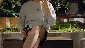 Shemale ting xuan pees outdoors and removes underwear for masturbation in the park