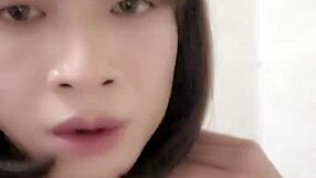 Shemale ting xuan pees outdoors and removes underwear for masturbation in the park