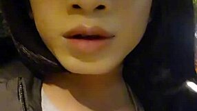 Shemale ting xuan pees outdoors and removes underwear for masturbation in the park