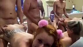 three blondes and redheads pose bent over in group amateur scene on sofa