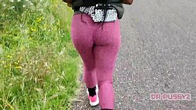 I'm watching this ebony pornstar with a big tattooed ass running in leggings in the forest.