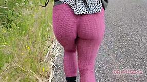 I'm watching this ebony pornstar with a big tattooed ass running in leggings in the forest.