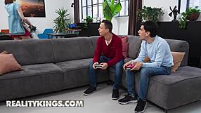 Lilly Mays sneaks off for cowgirl fuck while friend games!