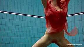 Hot Russian brunette Deniska strips naked underwater as a young 18+ teen