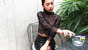 Young girl smokes topless in leather skirt and heels outdoors!