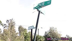 Student restrained in uniform outdoors