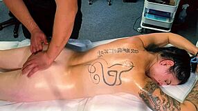 Male masseur spanks tattoo girl after teasing massage. She screams during dirty fuck.