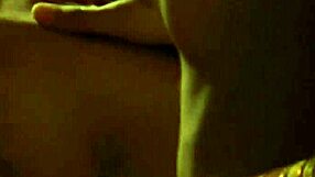 Asian brunette strips and dances erotically