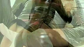 Babe in Latex Plays with Her Wet Slit