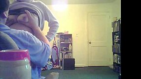 loris, the brunette milf, shows off her big tits in the living room setting