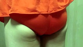 Cute girl in swimsuit forced to insert oversized anal plug for training