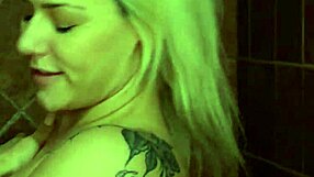 Blonde Model Bathes in Shower with Massage