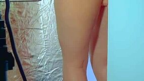 College Desi With A Sexy Dress And Sneakers Playing With Glass Dildo