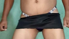 I dance in a purple satin thong from victoria's secret, teasing with lingerie and toys.