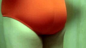 Cute girl in swimsuit forced to insert oversized anal plug for training