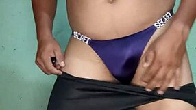I dance in a purple satin thong from victoria's secret, teasing with lingerie and toys.