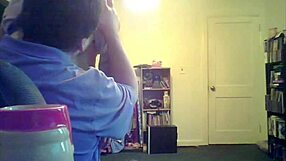 loris, the brunette milf, shows off her big tits in the living room setting