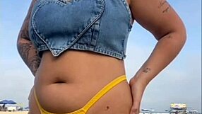 African exhibitionist flashes and arouses guy on beach