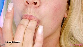 a fresh-faced blonde model poses naked in close-up