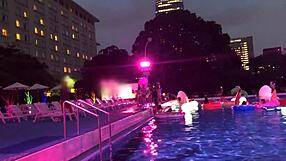 half-beautiful woman gets hardcore fucked in night pool