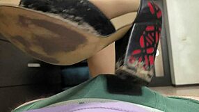 beautiful bbw goddess plays with slave's cock using heels and feet