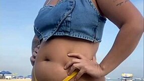 African exhibitionist flashes and arouses guy on beach