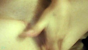 Hot chick fingering herself wet and sexy in the room