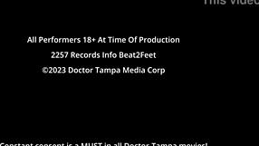 Giggles rubs feet on giant hot rock at beach