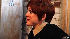 The cuffed redhead moaned as the brunette licked her pussy and ass.