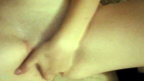 Hot chick fingering herself wet and sexy in the room