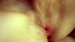 Hot chick fingering herself wet and sexy in the room