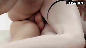 Russian Mistress Shares Erotic Moment With Two Studs.