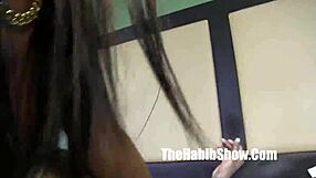 The stripper Redboned performs a juicy striptease for me.