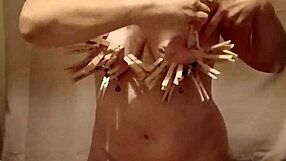 Female Slave's Intense Self-Bondage Session With Clamps And Belt