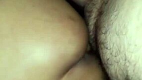 husband has fun with friend while wife records the scene