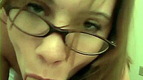 She gazes through her glasses, grabs your ass, and sucks your cock until it explodes.