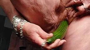 oma fucks her hairy pussy with a cucumber 😏