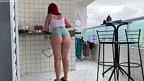 Latina maid cleans house seductively.