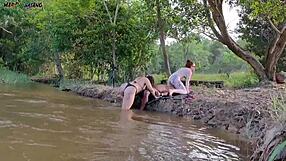 Intense outdoor threesome by river with two hotties sucking and creampied