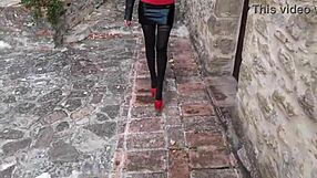 Milf walks in pantyhose and high heels