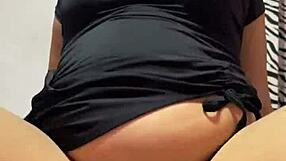 Sister-in-law returns from party in sexy dress. She chats about her evening in the kitchen.