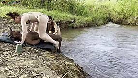 Intense outdoor threesome by river with two hotties sucking and creampied