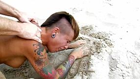 Short haired tattooed milf fucking on the beach