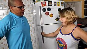 Blonde slut deepthroats big black cock in kitchen