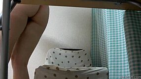 Japanese wedgie girl under the table: teasing with cameltoe and thong?