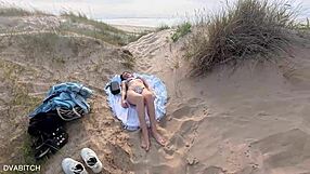 Sucking off my best friend at the public beach and taking cumshot on my pretty face