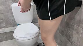 Cowgirl Rides A Fat Dildo In A Public Toilet